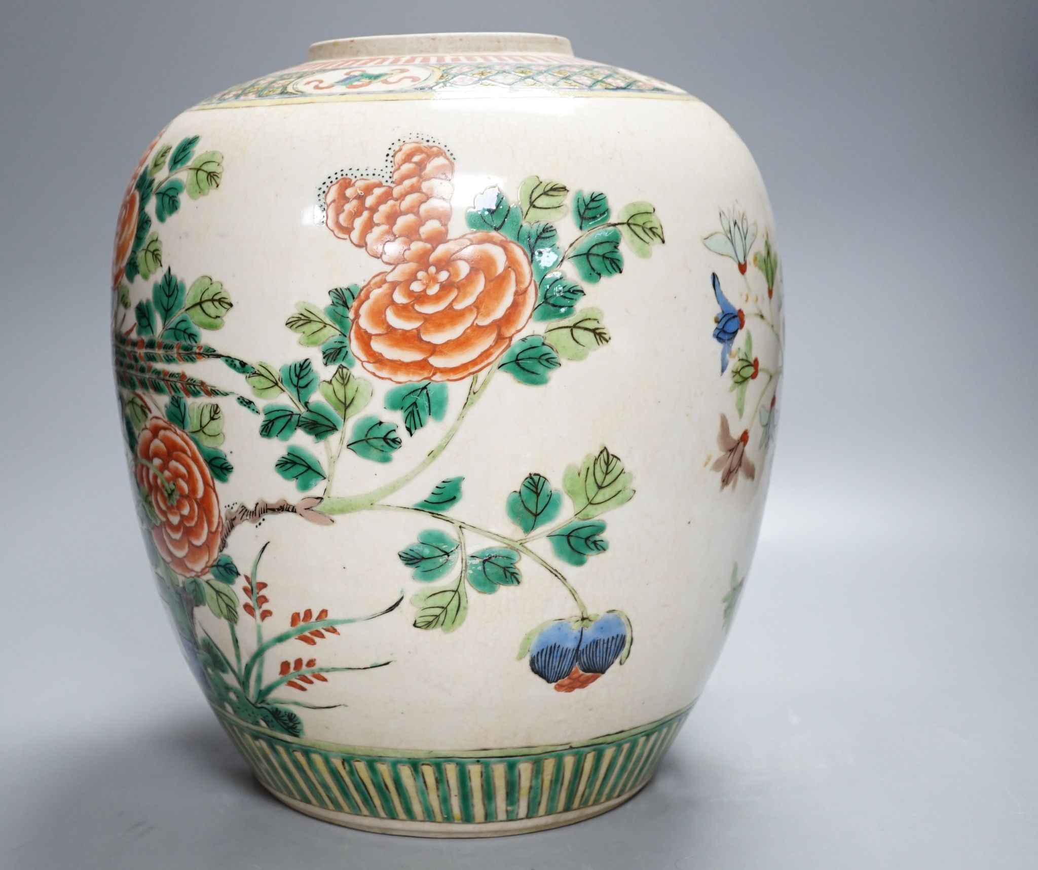 An early 20th century Chinese famille verte crackle glaze jar, 30cm